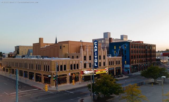 Capitol Theatre neon sign and historic downtown Flint architecture at dusk, Michigan