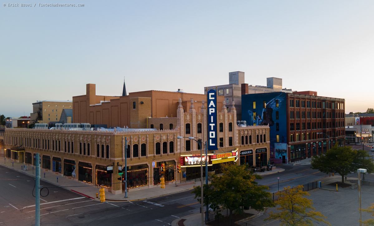 Capitol Theatre neon sign and historic downtown Flint architecture at dusk, Michigan