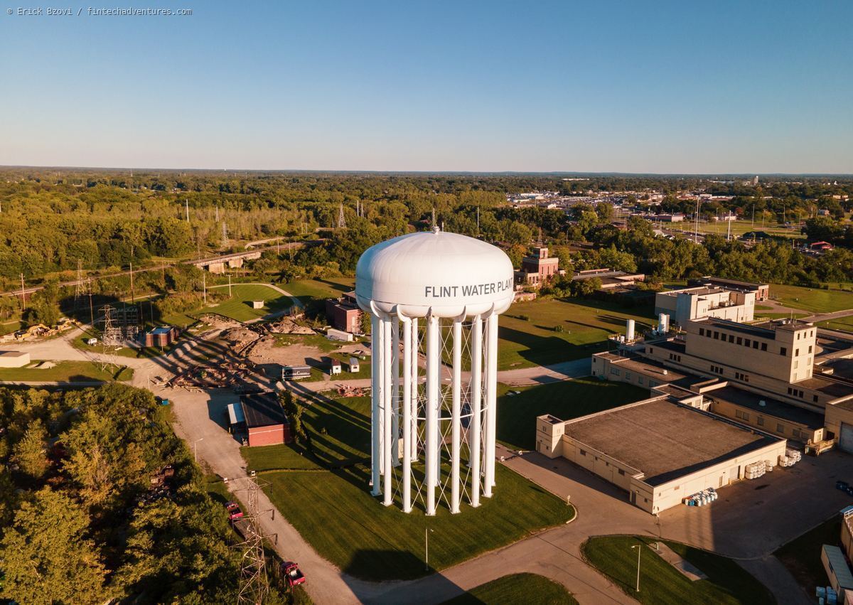 Aerial drone view of the Flint Water Plant water tower at golden hour, Flint, Michigan
