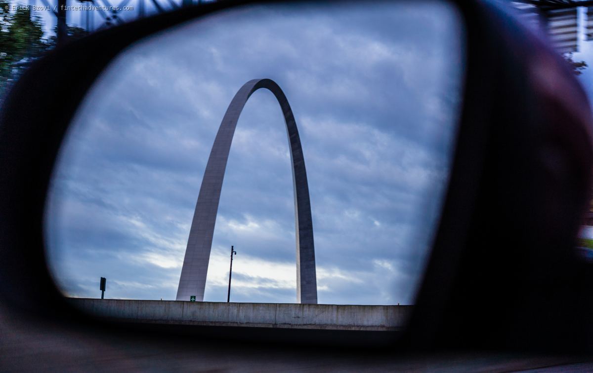 Gateway Arch reflected in a car side mirror while driving through St. Louis, Missouri