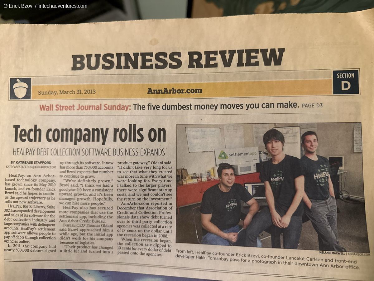 AnnArbor.com Business Review newspaper clipping: Tech company rolls on — HealPay co-founders Erick Bzovi, Lancelot Carlson and developer Hakki Tomanbay in their downtown Ann Arbor office, March 2013