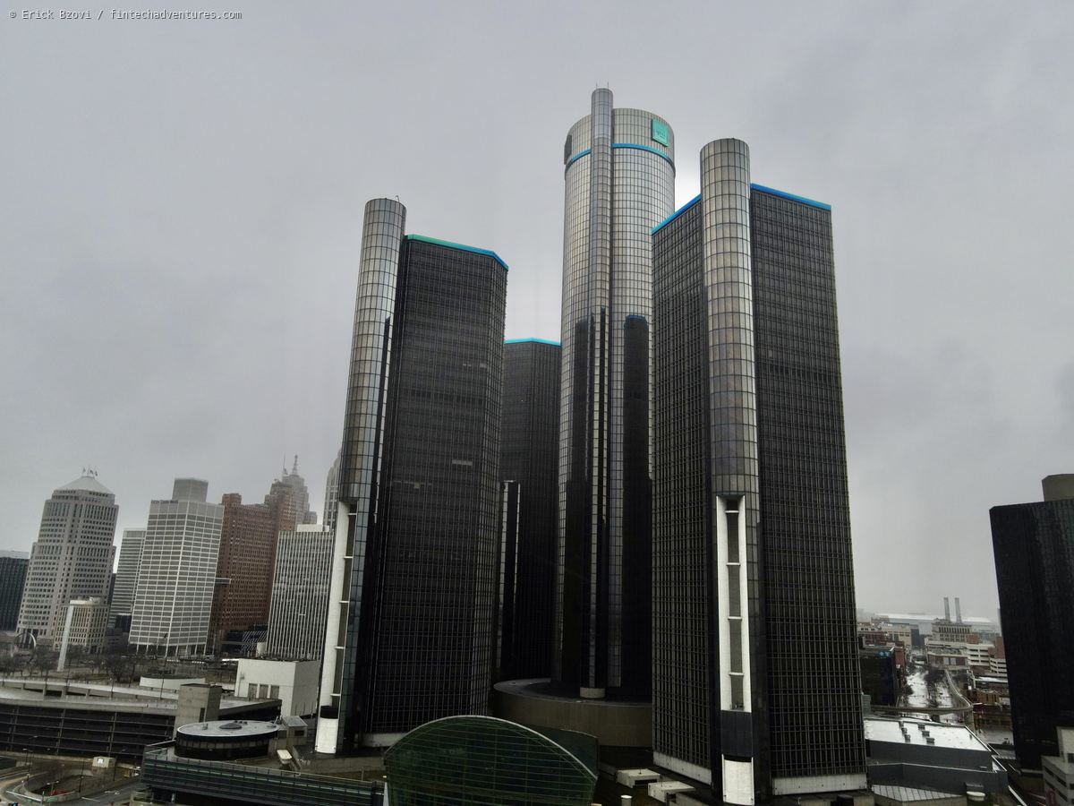 Aerial drone view of the Renaissance Center towers with the downtown Detroit skyline behind on an overcast day, Michigan