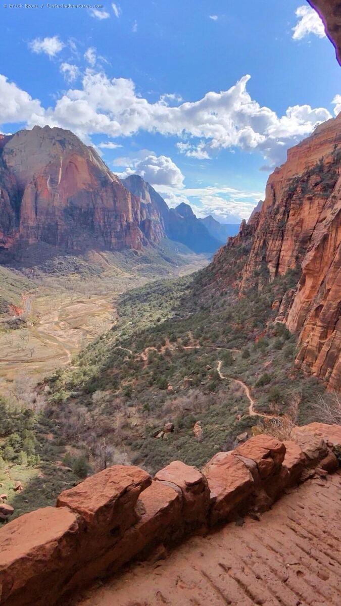 Valley overlook from Angels Landing trail in Zion National Park with sandstone cliffs and winding trail below